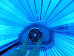 Man in Tanning Bed at Sunsations Idaho